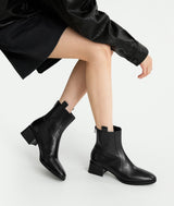 Get the look in these stylish black ankle boots, featuring a soft almond toe and a walk-ready block heel