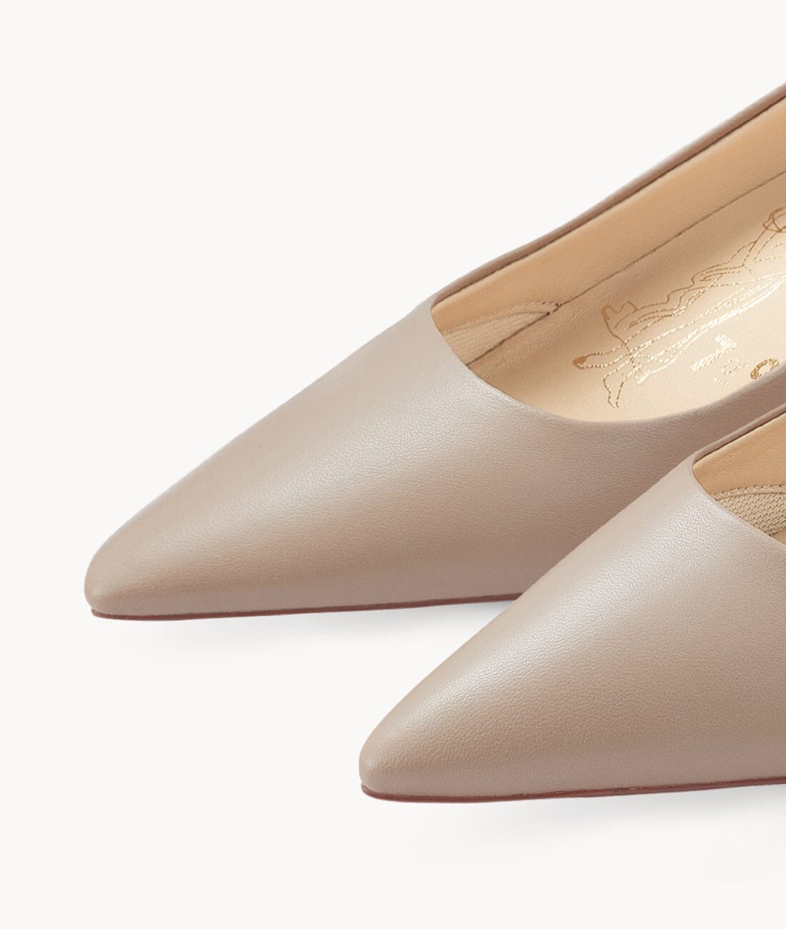 Nude close toed point toe heels