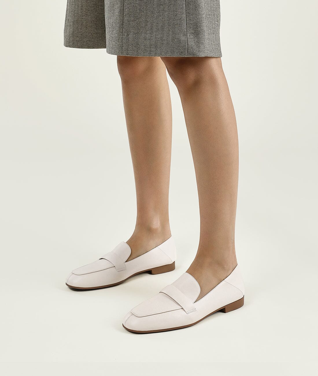 White close toed square toe loafers
