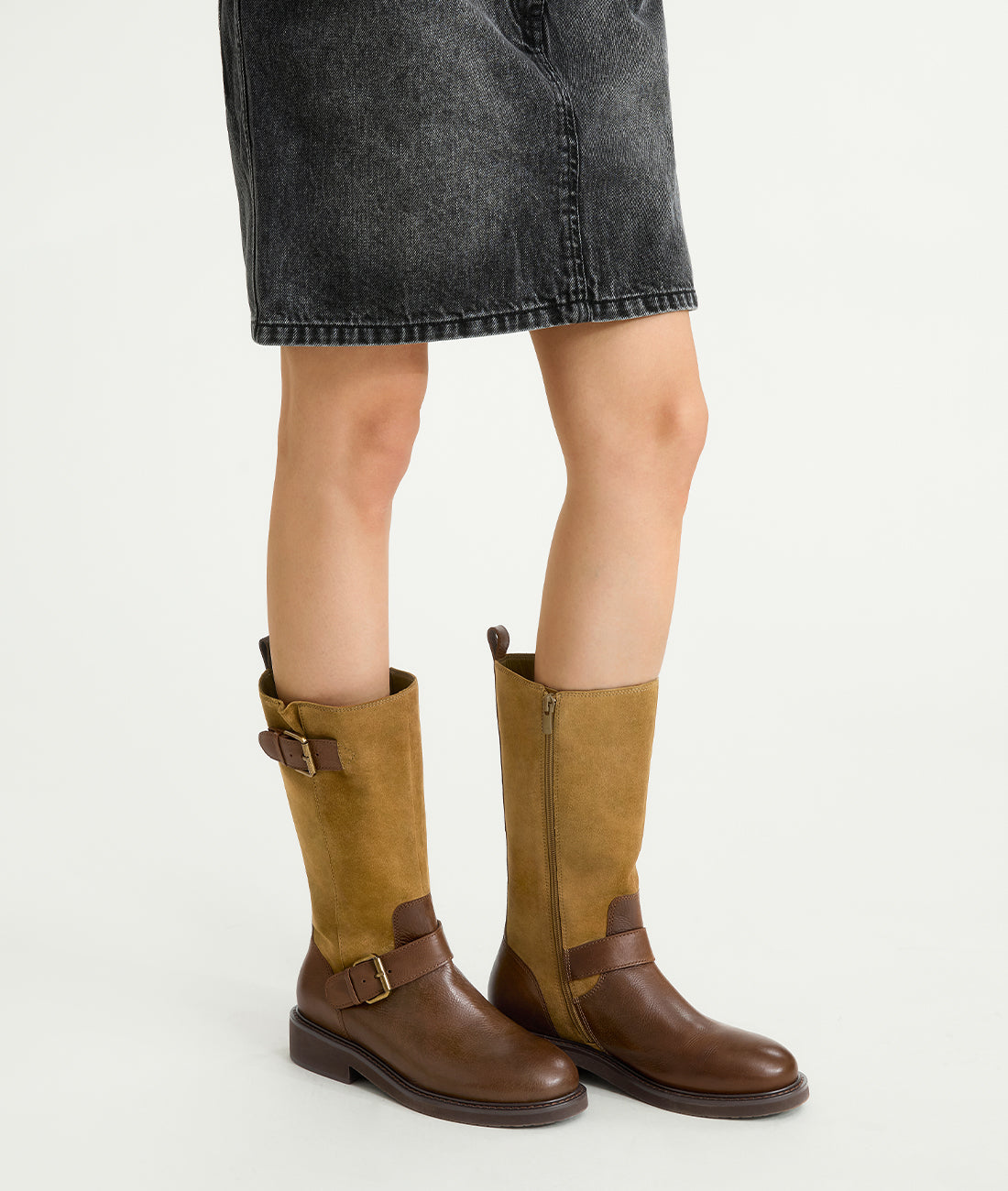 On-model shot of women's brown retro western boots, showing the fit and shaft height