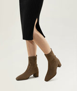 Green ankle heeled boots