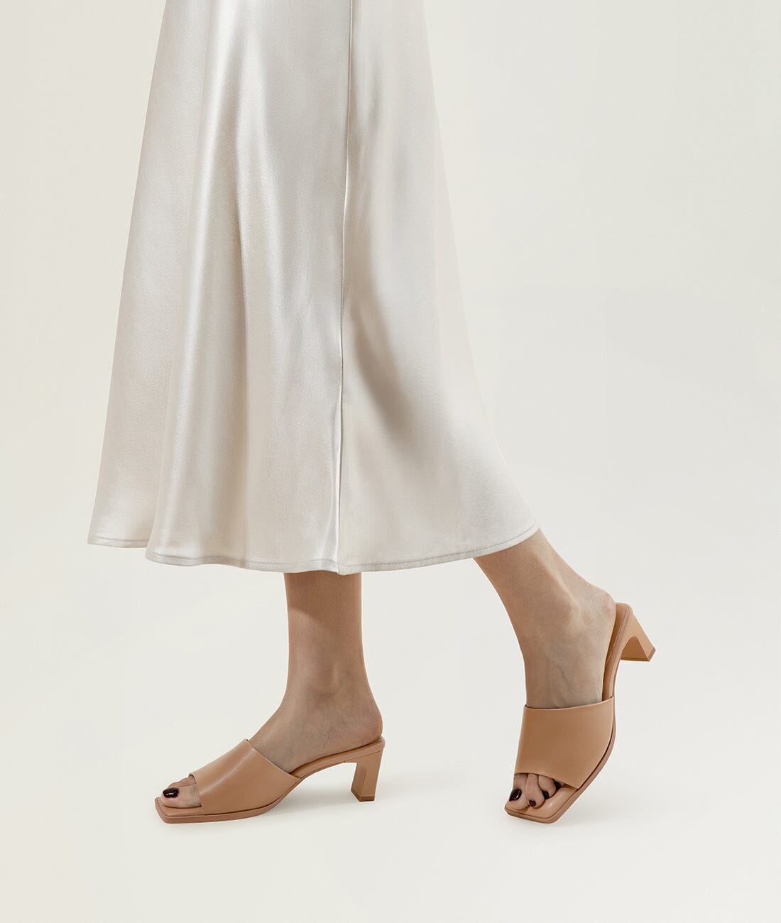 Brown slide sandals with heels