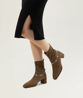 Green ankle heeled boots